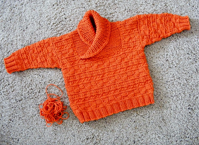 Orange knit Busy Baby Boy sweater in Cotton Fleece