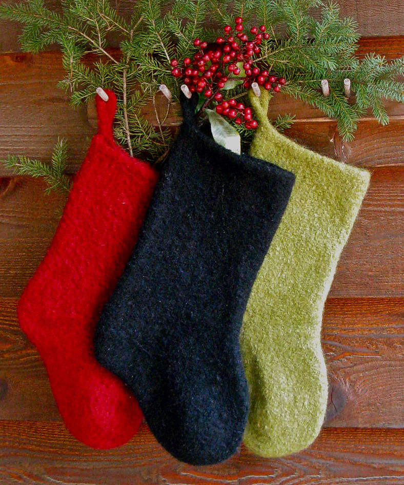 a trio of felted holiday Christmas stockings