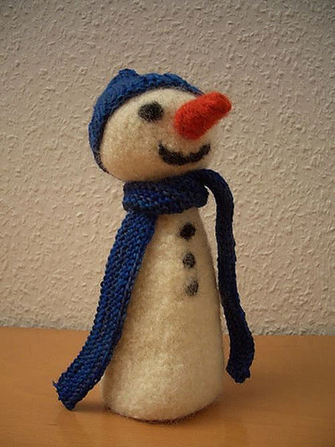 felted snowman with hat and scarf