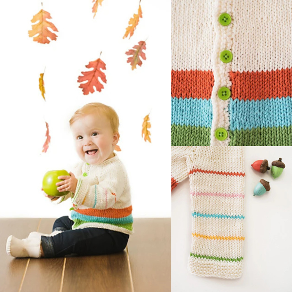 A happy baby sits holding a bright green apple and wearing a cream colored handknit cardigan. Two inset photos show the colorwork details on the sweater, which feature thin mutlicolor stripes in the sleeves and thick multicolor stripes at the bottom of the cardigan.